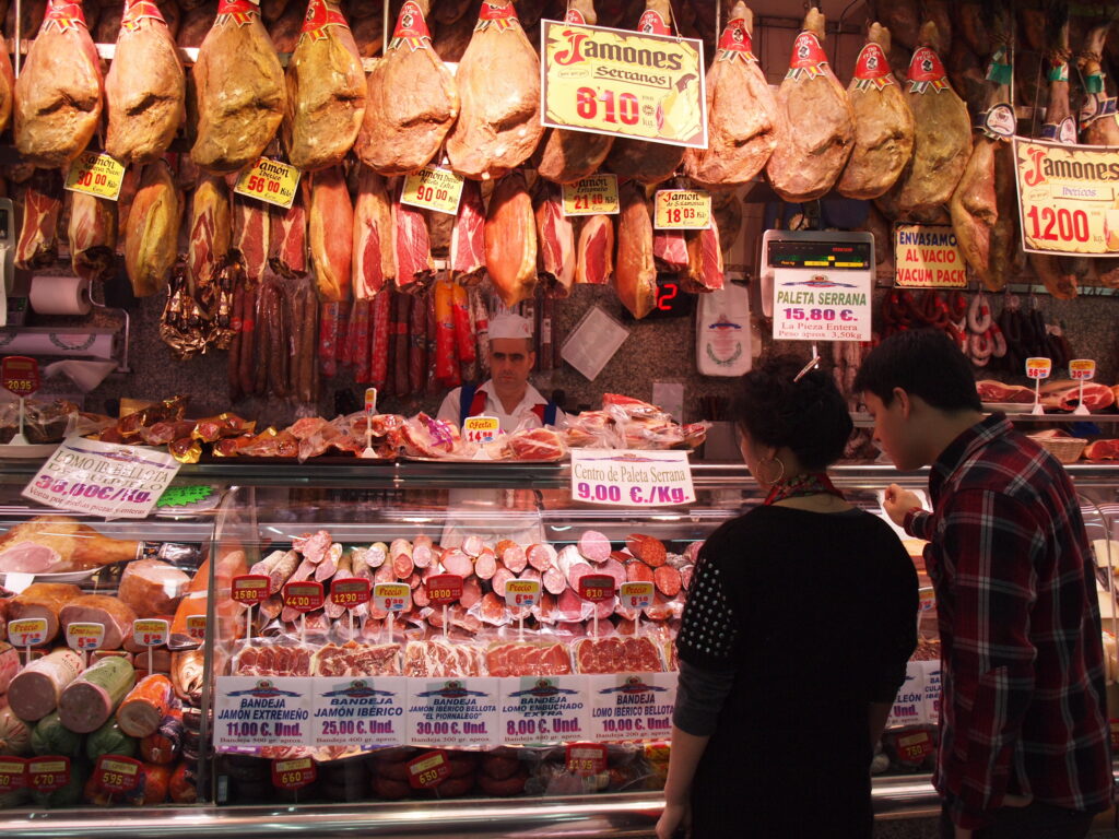 Enjoying the cured ham - Madrid, Spain